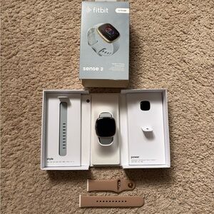 Fitbit Sense 2 soft gold and blue